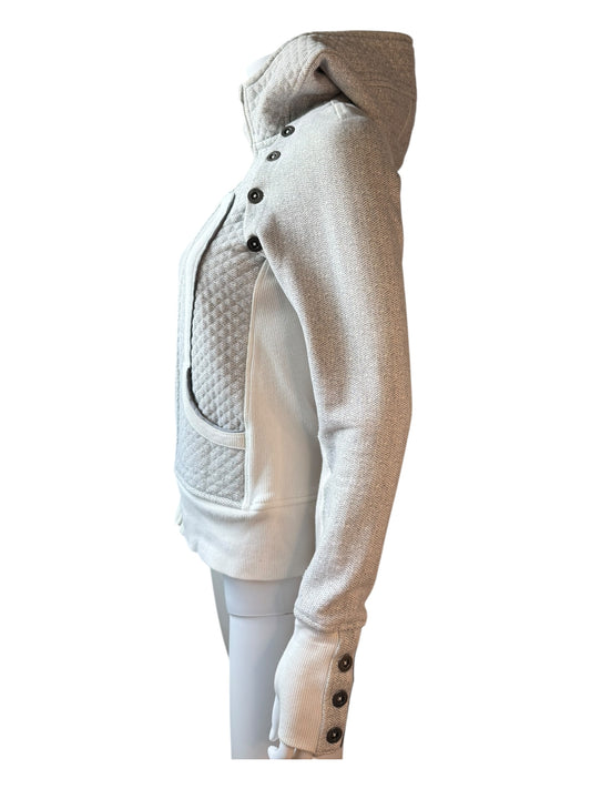 White quilted jacket with beige hood on a white background