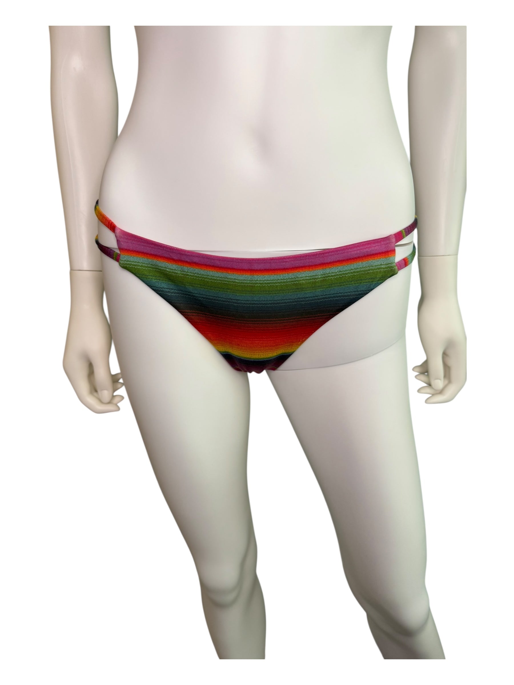 Mannequin wearing a colorful striped bikini bottom on a white background